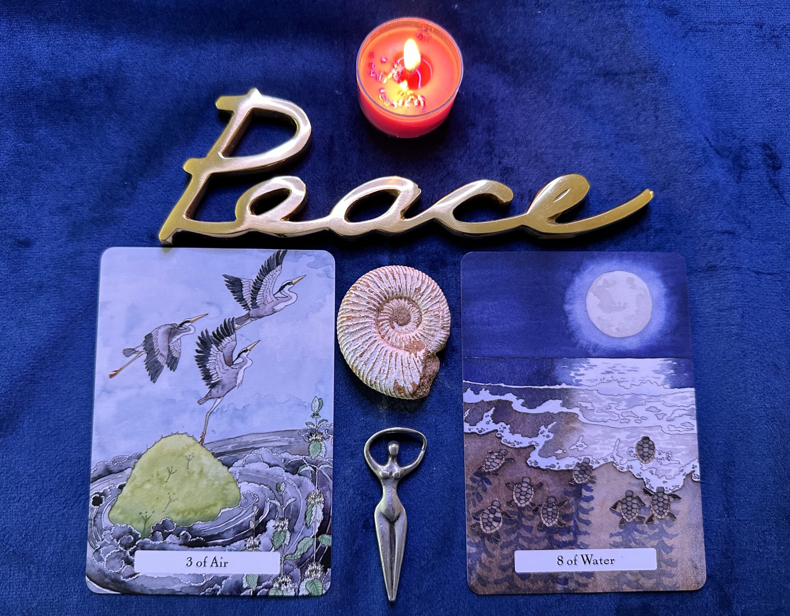 2-Card Tarot Reading wit candle, Peace art, Divine Feminine figurine and ammonite.