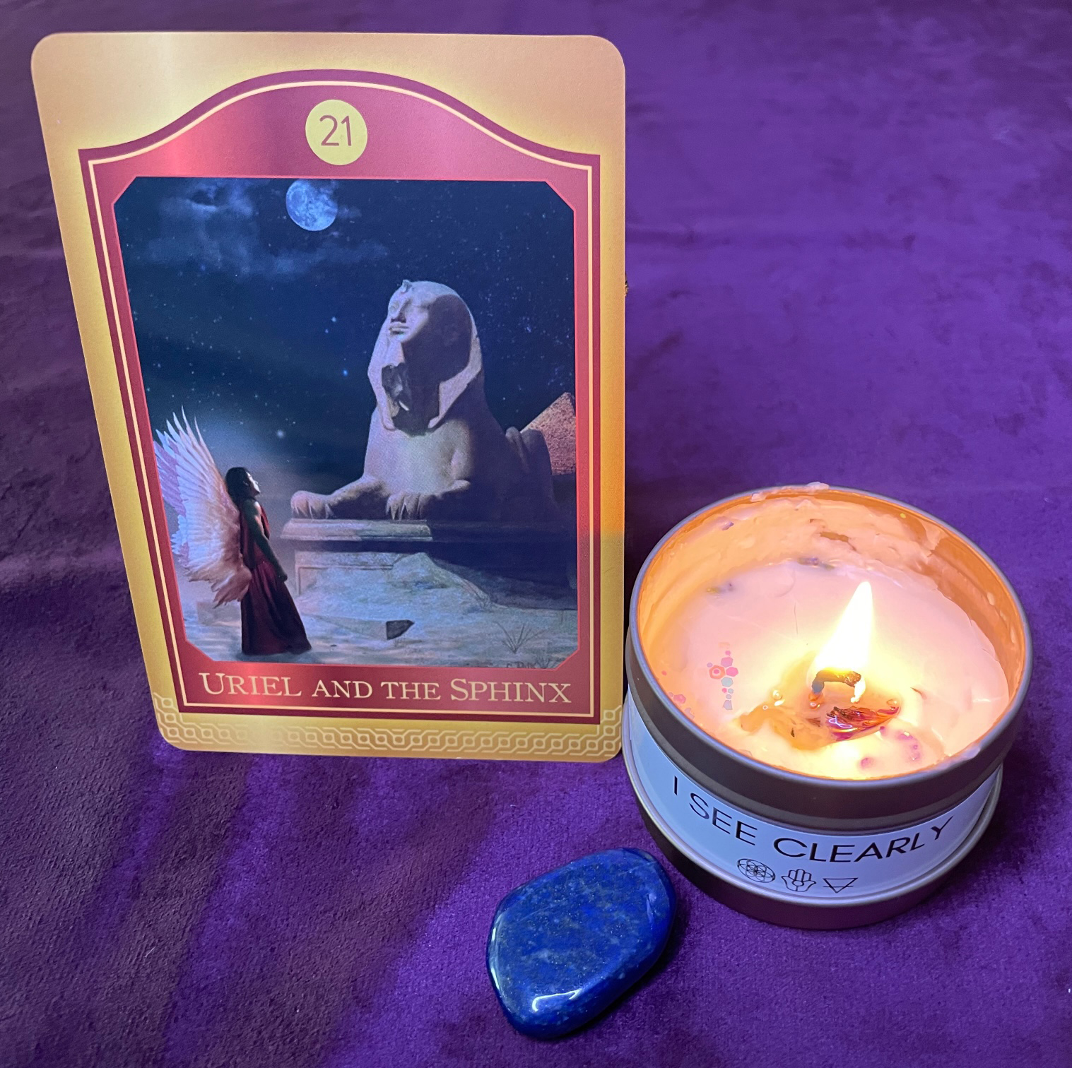 Akashic Tarot Card "Uriel and The Sphinx, "I See Clearly" affirmation candle, and blue lapis stone