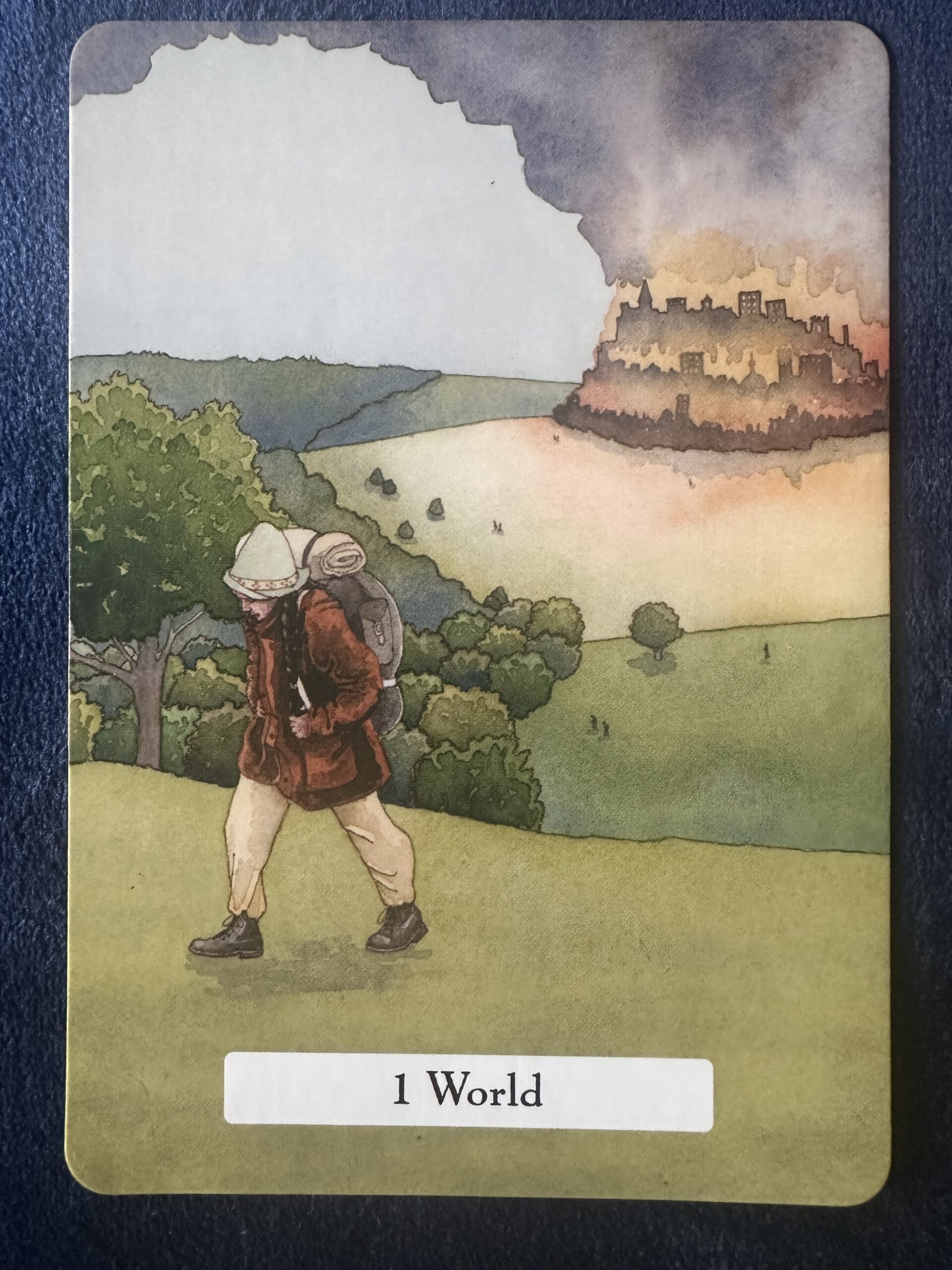 image of person walking away from a burning city